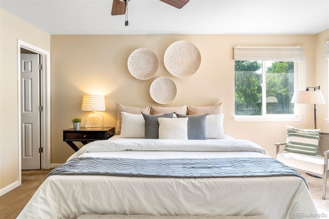 9168 W 50th Ln Unit 1, Arvada, CO 80002 - carpeted bedroom featuring baseboards and a ceiling fan