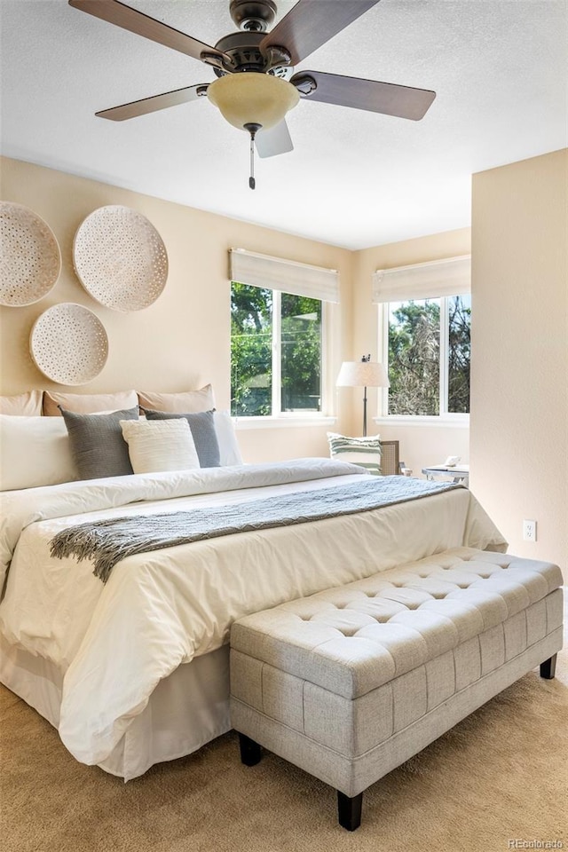9168 W 50th Ln Unit 1, Arvada, CO 80002 - carpeted bedroom featuring a ceiling fan