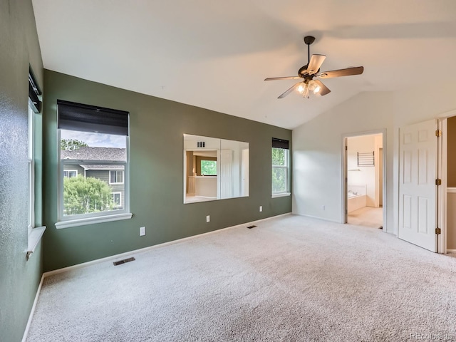 5163 Apache Creek Rd, Castle Rock, CO 80109 - unfurnished bedroom featuring carpet flooring, vaulted ceiling, baseboards, ensuite bathroom, and a ceiling fan