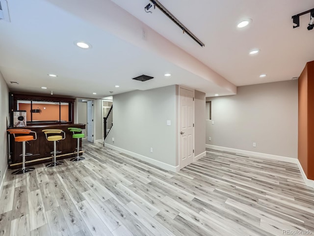 5163 Apache Creek Rd, Castle Rock, CO 80109 - indoor bar with light wood-style flooring, baseboards, and recessed lighting