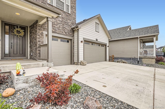 1403 Hart Ln, Elizabeth, CO 80107 - view of property exterior featuring stone siding, driveway, and a garage