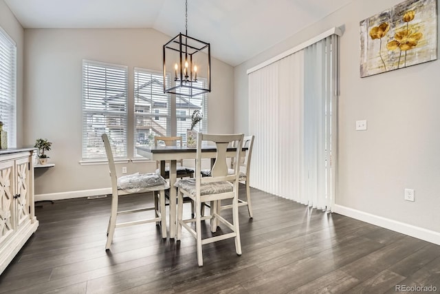 1403 Hart Ln, Elizabeth, CO 80107 - dining area featuring a chandelier, lofted ceiling, dark wood-style floors, and baseboards