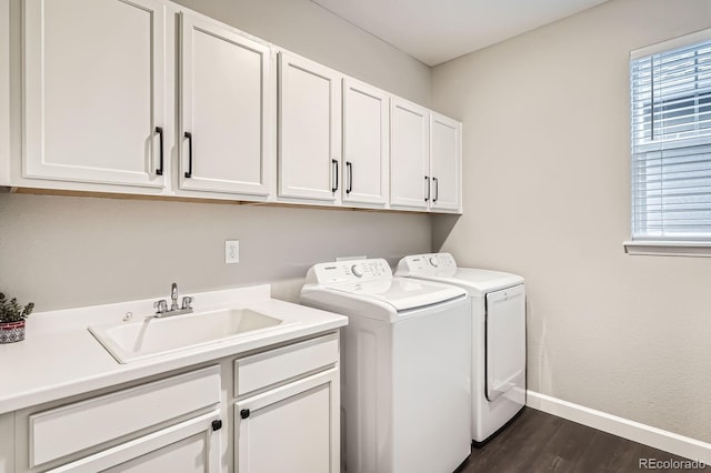 1403 Hart Ln, Elizabeth, CO 80107 - washroom with cabinet space, independent washer and dryer, dark wood-type flooring, and baseboards