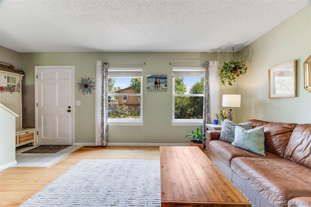 1565 Sagrimore Cir, Lafayette, CO 80026 - living room with wood finished floors and a textured ceiling