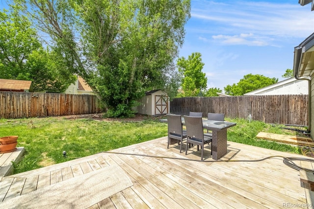 1565 Sagrimore Cir, Lafayette, CO 80026 - deck with a storage shed, outdoor dining area, and a fenced backyard