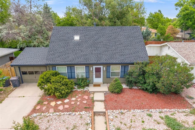 1565 Sagrimore Cir, Lafayette, CO 80026 - new england style home featuring roof with shingles, an attached garage, and driveway