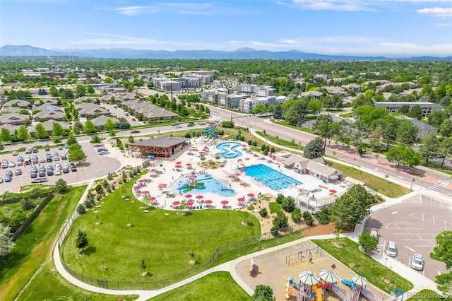 1565 Sagrimore Cir, Lafayette, CO 80026 - drone / aerial view of a pool area and mountains