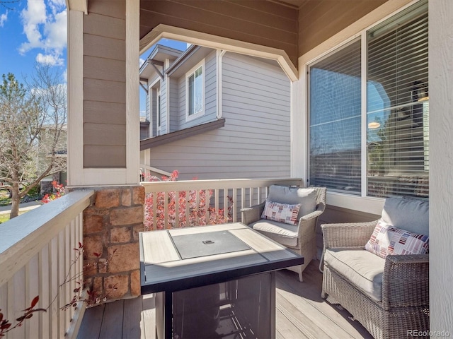 deck with an outdoor hangout area