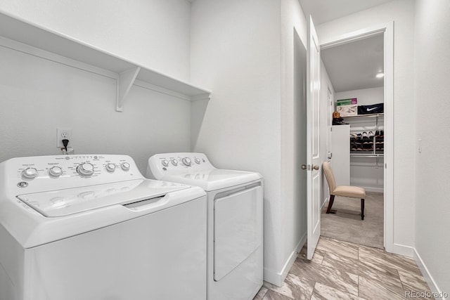 laundry area featuring separate washer and dryer