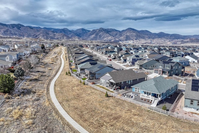 drone / aerial view featuring a mountain view