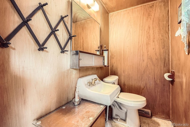 bathroom with visible vents, toilet, and a sink