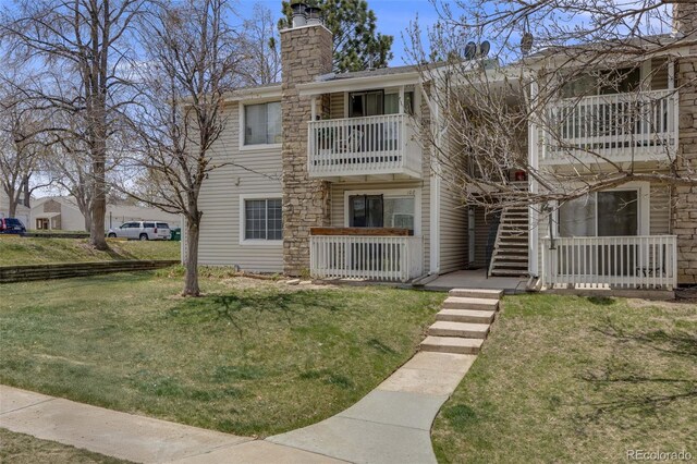 14192 E Colorado Dr Unit 102, Aurora, CO 80012 - view of building exterior featuring stairway