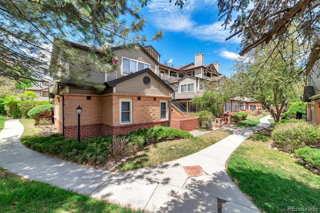6001 S Yosemite St Unit B203, Greenwood Village, CO 80111 - craftsman-style home featuring brick siding