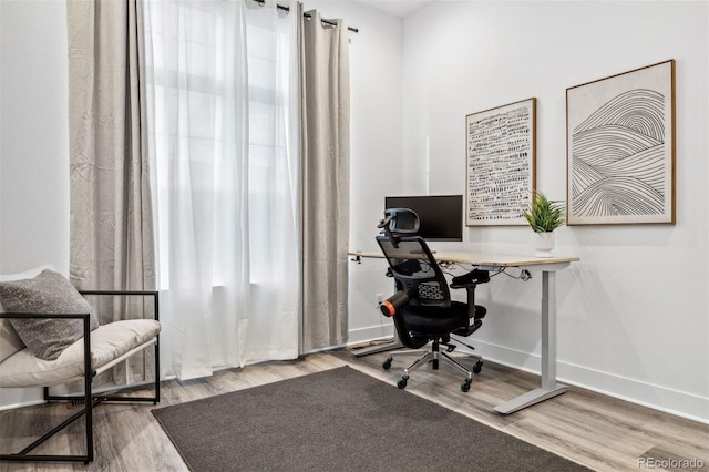 home office featuring light hardwood / wood-style flooring