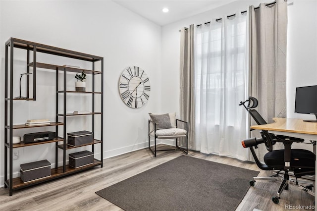 home office featuring light hardwood / wood-style flooring