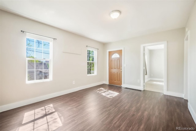 614 W Kiowa St, Colorado Springs, CO 80905 - entryway with baseboards and dark wood-style floors