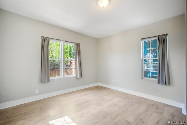 614 W Kiowa St, Colorado Springs, CO 80905 - spare room with wood finished floors and baseboards
