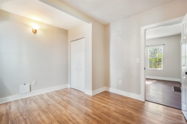 614 W Kiowa St, Colorado Springs, CO 80905 - spare room with light wood finished floors and baseboards