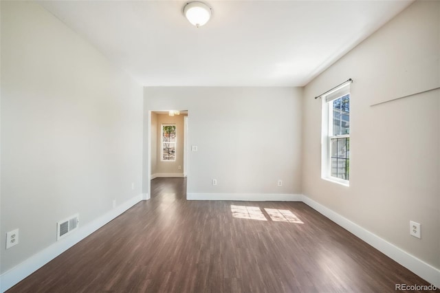 614 W Kiowa St, Colorado Springs, CO 80905 - unfurnished room featuring dark wood-type flooring and baseboards
