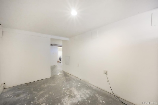 614 W Kiowa St, Colorado Springs, CO 80905 - empty room featuring concrete flooring and washer / dryer