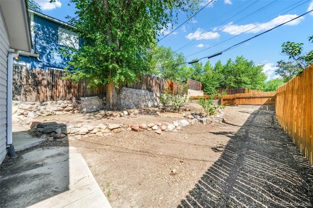 614 W Kiowa St, Colorado Springs, CO 80905 - fenced backyard featuring a patio area