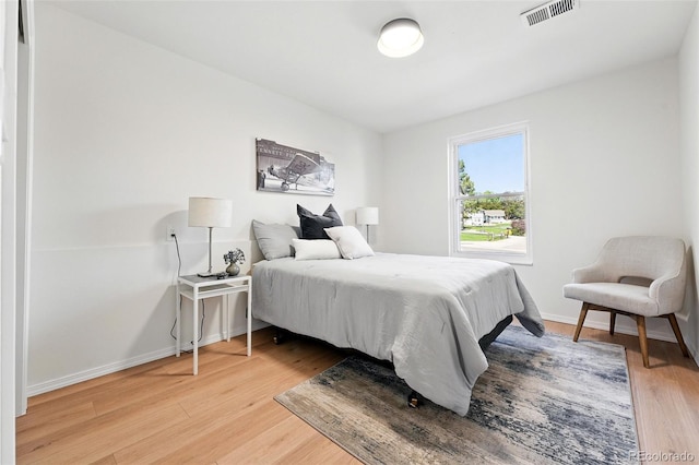 5616 S Kenton Ct, Englewood, CO 80111 - bedroom with light wood-style floors and baseboards