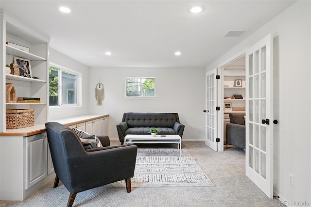 5616 S Kenton Ct, Englewood, CO 80111 - living room with french doors, light carpet, recessed lighting, and baseboards