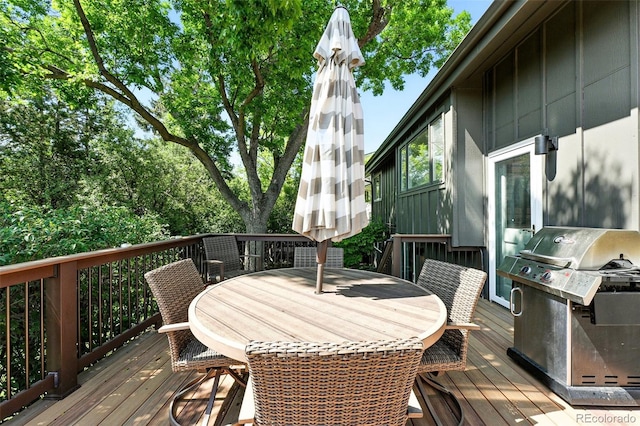 5616 S Kenton Ct, Englewood, CO 80111 - deck featuring outdoor dining space and area for grilling