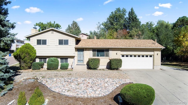 split level home with a garage