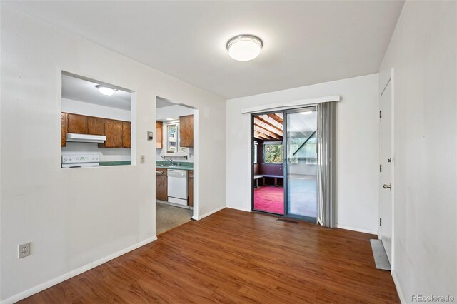 interior space with dark hardwood / wood-style floors