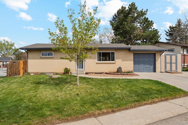 single story home with fence, brick siding, a garage, a shed, and concrete driveway