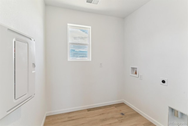449 S Salida St, Aurora, CO 80017 - laundry room featuring washer hookup, hookup for an electric dryer, light wood finished floors, and baseboards