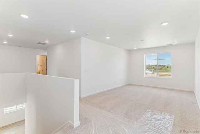 449 S Salida St, Aurora, CO 80017 - empty room with recessed lighting, baseboards, and light colored carpet