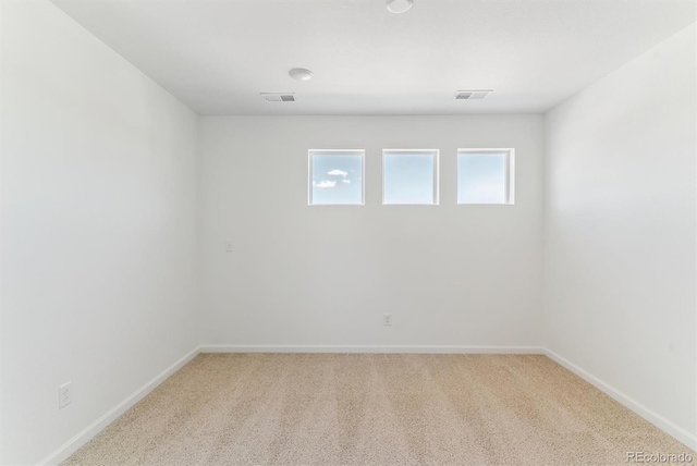 449 S Salida St, Aurora, CO 80017 - unfurnished room with baseboards and light colored carpet