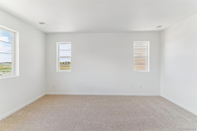 449 S Salida St, Aurora, CO 80017 - unfurnished room featuring carpet floors, baseboards, and a smoke detector