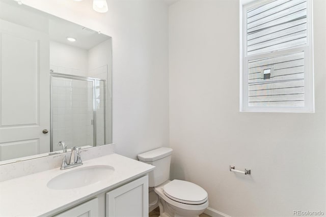 449 S Salida St, Aurora, CO 80017 - full bath featuring a stall shower, vanity, toilet, and baseboards