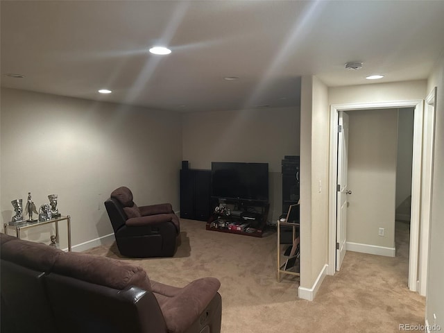 15501 E 112th Ave Unit 28E, Commerce City, CO 80022 - living area with light colored carpet, recessed lighting, and baseboards
