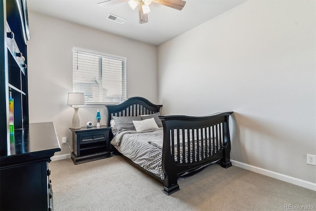 bedroom with visible vents, carpet flooring, baseboards, and ceiling fan