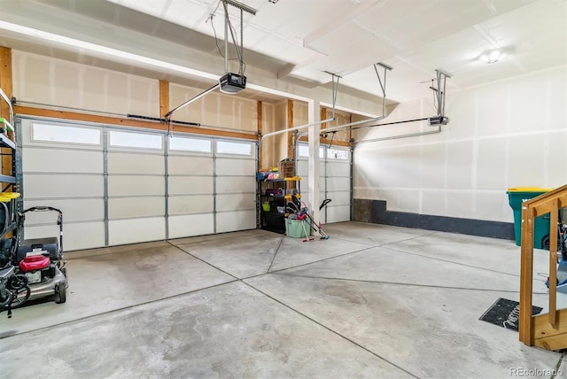 garage featuring a garage door opener