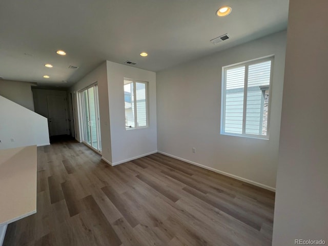 6599 N Netherland St, Aurora, CO 80019 - unfurnished room featuring recessed lighting and wood finished floors