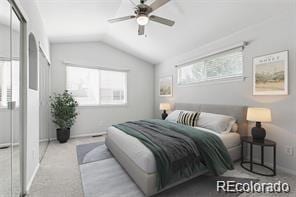 bedroom featuring multiple windows, ceiling fan, light colored carpet, and vaulted ceiling