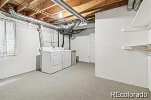 basement featuring washer and dryer