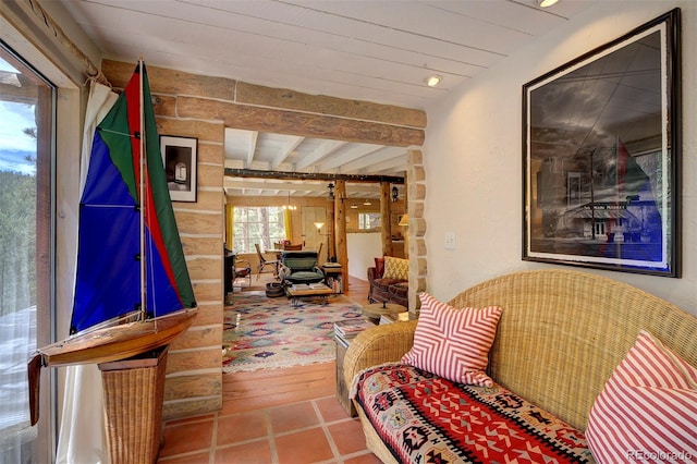 interior space featuring wood-type flooring and beam ceiling