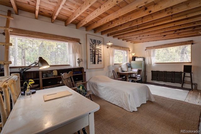 bedroom with multiple windows, beamed ceiling, and wooden ceiling