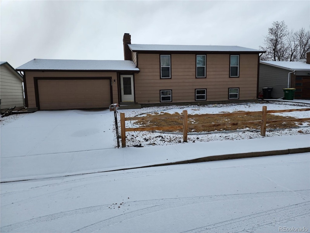 tri-level home featuring a garage