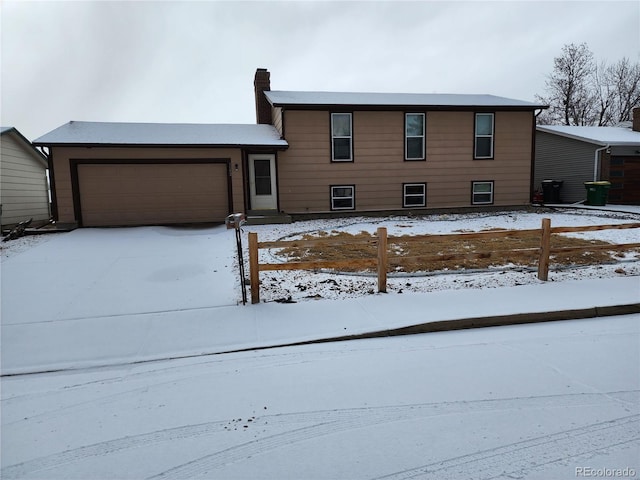 tri-level home featuring a garage