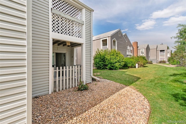 3341 S Monaco Pkwy Unit A, Denver, CO 80222 - view of grassy yard featuring a residential view