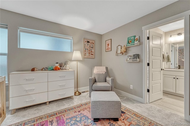 6366 N Emporia St, Denver, CO 80238 - living area featuring light colored carpet and baseboards