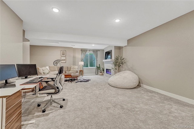 6366 N Emporia St, Denver, CO 80238 - carpeted home office featuring a glass covered fireplace and recessed lighting