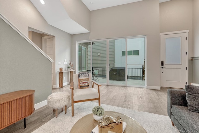 6366 N Emporia St, Denver, CO 80238 - living area featuring wood finished floors and baseboards